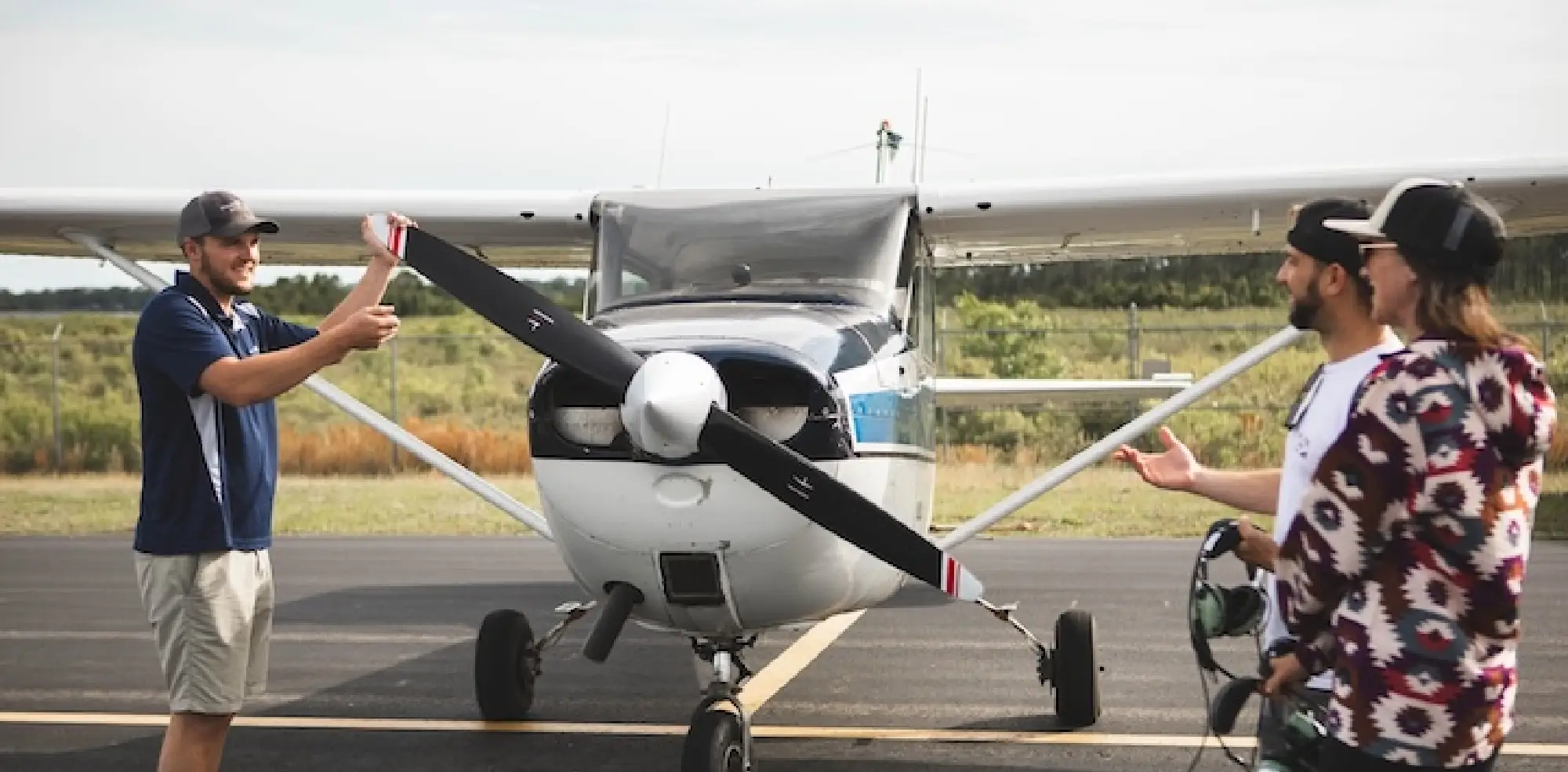 Private pilot student posing in front of a Cessna 172 Skyhawk on St Simons Island