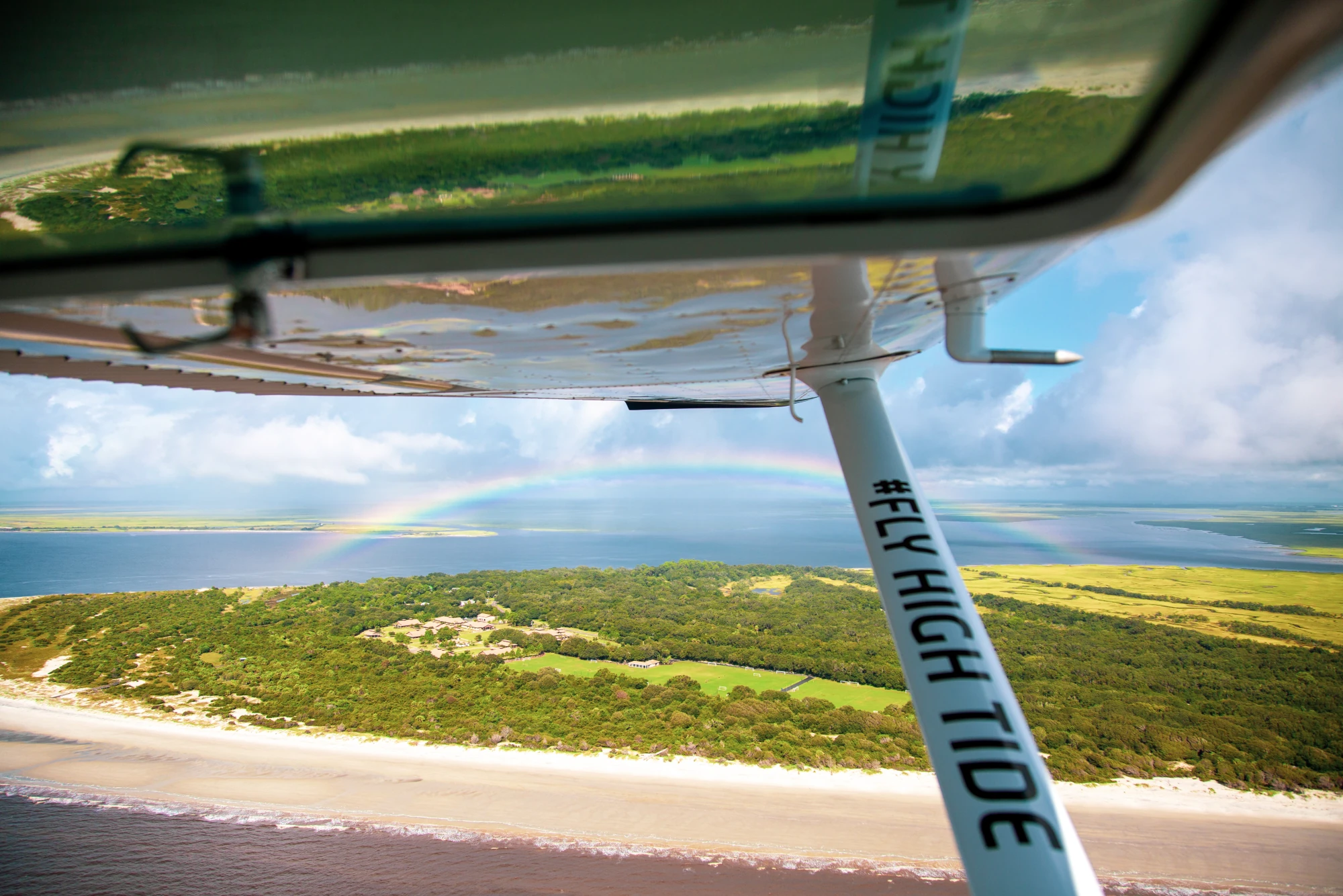 Rainbow looking down a High Tide wing